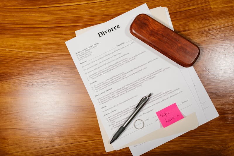 Divorce document with pen on desk